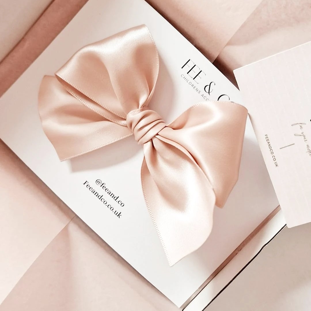 Nude satin oversized bow