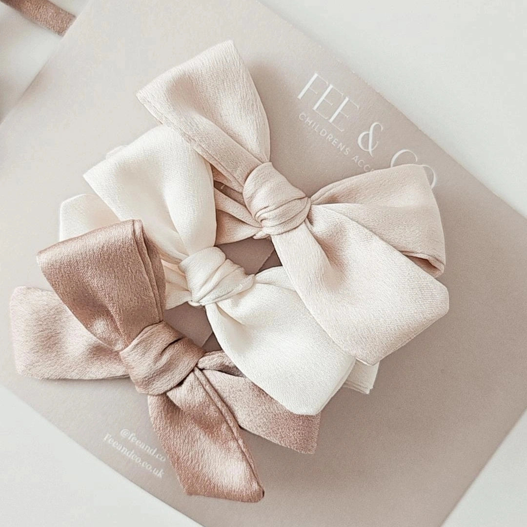 Neutral satin bow